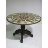 A VICTORIAN MAHOGANY CARVED CENTRE TABLE with later specimen marble top,