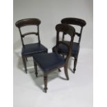 A SET SIX VICTORIAN MAHOGANY DINING ROOM CHAIRS each with a curved top rail and splat above