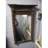 A VICTORIAN MAHOGANY FRAMED MIRROR the rectangular plate within a half pilaster frame with beadwork