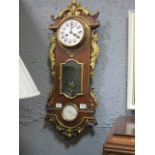 A FRENCH STYLE KINGSWOOD AND GILT BRASS MOUNTED WALL CLOCK the white enamel dial with black roman