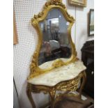 A CONTINENTAL GILT WOOD CONSOLE TABLE AND MIRROR the shaped plate with moulded frame with cartouche