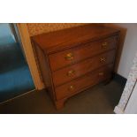 19thC mahogany chest of three long graduated drawers on bracket feet