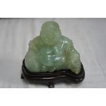 Pale green jade Laughing Buddha?. Ht. 3.5 ins.