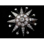 Victorian diamond star shaped brooch set in gold and platinum with 3.5 ct approx. of diamonds