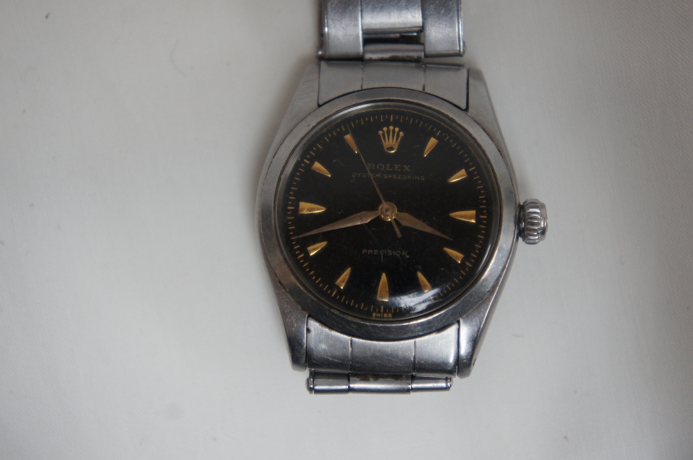 Rolex Oyster Speedking with stainless steel case and expanding strap, black dial, gold hour marks,