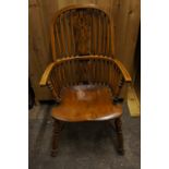 Victorian style comb back Windsor chair with elm seat, turned legs and crinoline stretcher