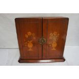 19th / 20thC floral inlaid cutlery cabinet with silk, satin and velvet fitted interior. Ht. 12 ins.