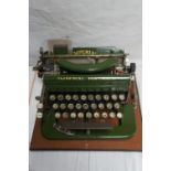 Imperial Portable Typewriter circa 1920s. Khaki with gold letters. Boxed with manual