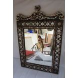 19thC Middle Eastern wall mirror with parquetry decoration of stars and scrolls in mother of pearl