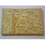 19thC Chinese finely carved card case with decoration of figures in gardens, 95 x 58 mm