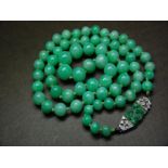 Art Deco 18ct white gold, platinum, green jade graduated bead necklace with diamonds to clasp.