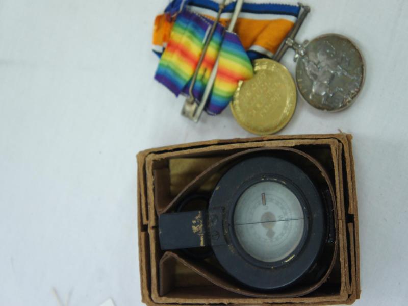 T.G. Co. Ltd London WWII compass with mother of pearl dial, boxed, together with two WWI medals - Image 2 of 2