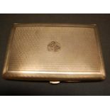 9ct gold cigarette case having engine-turned decoration and the initials E D inset with diamonds.