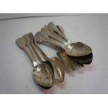 Fifteen 19thC silver fiddle pattern pudding spoons. 23ozt.