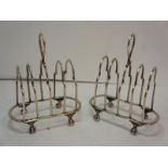 Pair of late Victorian silver wire four slice breakfast toast racks on ball and claw feet. Sheffield