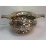 Good quality two-handled silver bowl with entwined dragon chased decoration. London 1910, 37ozt.,