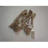 Thirteen Georgian and later silver fiddle pattern dessert forks. 20ozt.