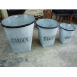 Set of three graduated, two-handled galvanised buckets marked "GARDEN". Ht. 50cm