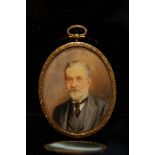 19thC oval portrait miniature on ivory of a grey-haired gentleman in a gold metal frame, cased. 2.75