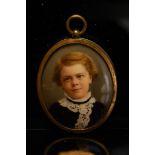 Two 20thC oval portrait miniatures in gold metal frames