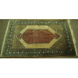 Fine 19th / 20thC Persian silk carpet with seven borders surrounding diamond shaped central panel