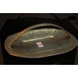 Archibald Knox Tudric pewter bread basket with stylized leaf decoration No. 0357 length 12.125ins.