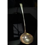 GIII silver soup ladle of plain form. London 3.8ozt, maker J.L.