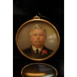 Early 20thC circular portrait miniature on ivory of a gentleman wearing a pink carnation. Diameter