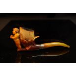 19thC cherub and heart carved meerschaum pipe with amber mouth-piece in original fitted case