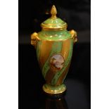 Pretty Coalport green gilded lidded vase decorated with miniature landscape panel. Ht. 4ins.