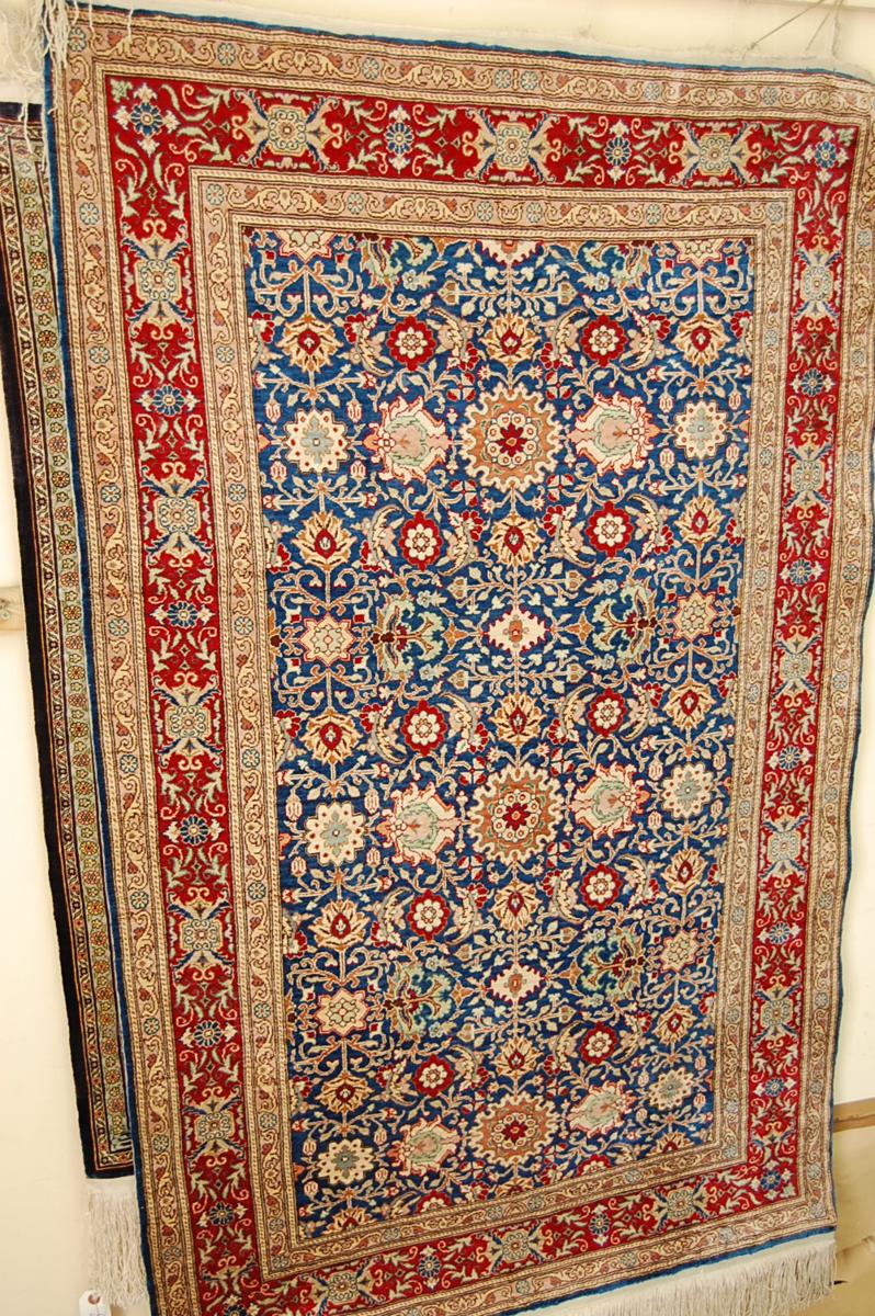 Fine Tabriz carpet with decoration of animals, birds and flowers in multi-coloured wools with silk