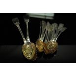 Fourteen GIII and later silver berry spoons together with two serving spoons. Total weight 14ozt.