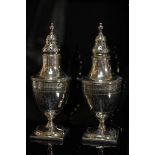 Pair GIII urn-shaped silver pepper pots with bright cut decoration on square base, London 1795,