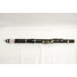 Small unmarked Lignum Vitae piccolo with nickel mounts, length 310mm