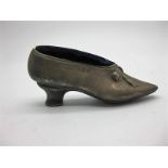 Silver pincushion in the form of a heeled shoe. Birmingham 1983, maker A M and Co. 2.75 inches long