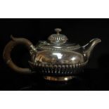 GIII silver half-fluted small teapot with flower bud finial, London 1820, maker W.E., 10ozt.