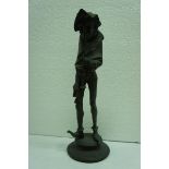 Late 19thC spelter Pied Piper figure candlestick. Ht. 13 ins.