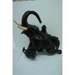 19thC Japanese brown patinated bronze of an elephant being attacked by three tigers with signature