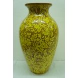 Large art pottery vase in the manner of Burmantofts with floral decoration on a yellow ground. Ht.