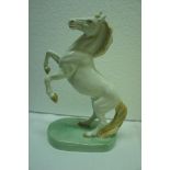 Wade figure of a rearing horse by Faust Lang, dated 1939. Ht. 7.5 ins.