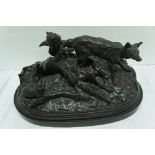 Pierre Jules Mene (1810 - 1879). Dark Brown patinated bronze group of a fox, vixen and cubs.