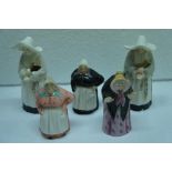 Collection of Royal Worcester candle snuffers - two nuns, two French cooks and an old lady