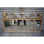 Regency style gilt wood and gesso over-mantel mirror with winged griffins, acanthus and floral