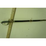 Victorian British officer's sword with brass mounts to black leather scabbard. 32.5 ins. single-