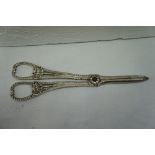 Pair of Victorian silver grape scissors with shell, feather and bow decoration