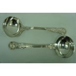 Pair of Victorian ornate silver sauce ladles, London 1845. Makers Samuel Hayne and Dudley Cates