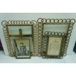 Four Edwardian brass chain link photo frames, two large and two small