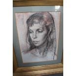 Colin Jones, Head and shoulders portrait of a young girl, Pastel, signed, 21 x 15 ins.