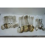 Collection of late Georgian and Victorian silver flatware consisting of sixteen dessert spoons,