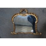 19th / 20thC carved gilt wood mirror with shell border. 18 x 23 ins.